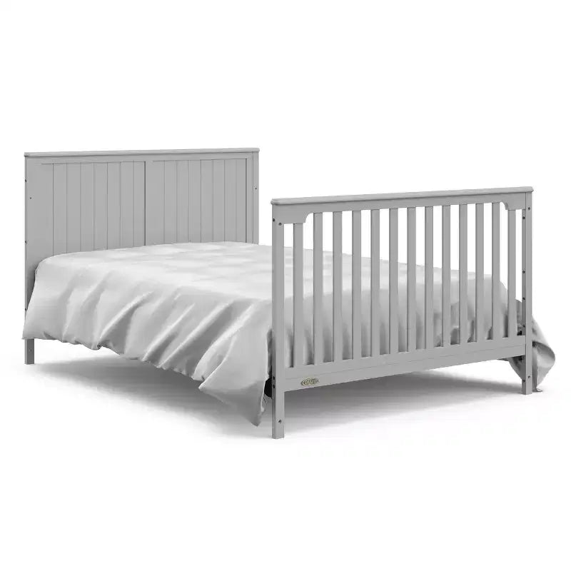 Lit bébé convertible 5-en-1 et table à langer avec tiroir