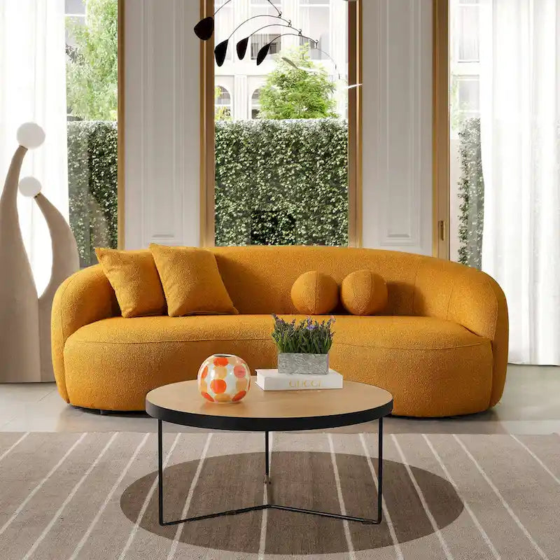 Blaine — luksusowa, nowoczesna sofa w stylu japandi z zakrzywionym oparciem, obita tkaniną boucle