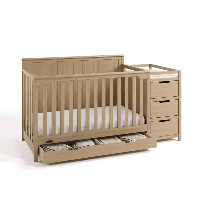 Lit bébé convertible 5-en-1 et table à langer avec tiroir